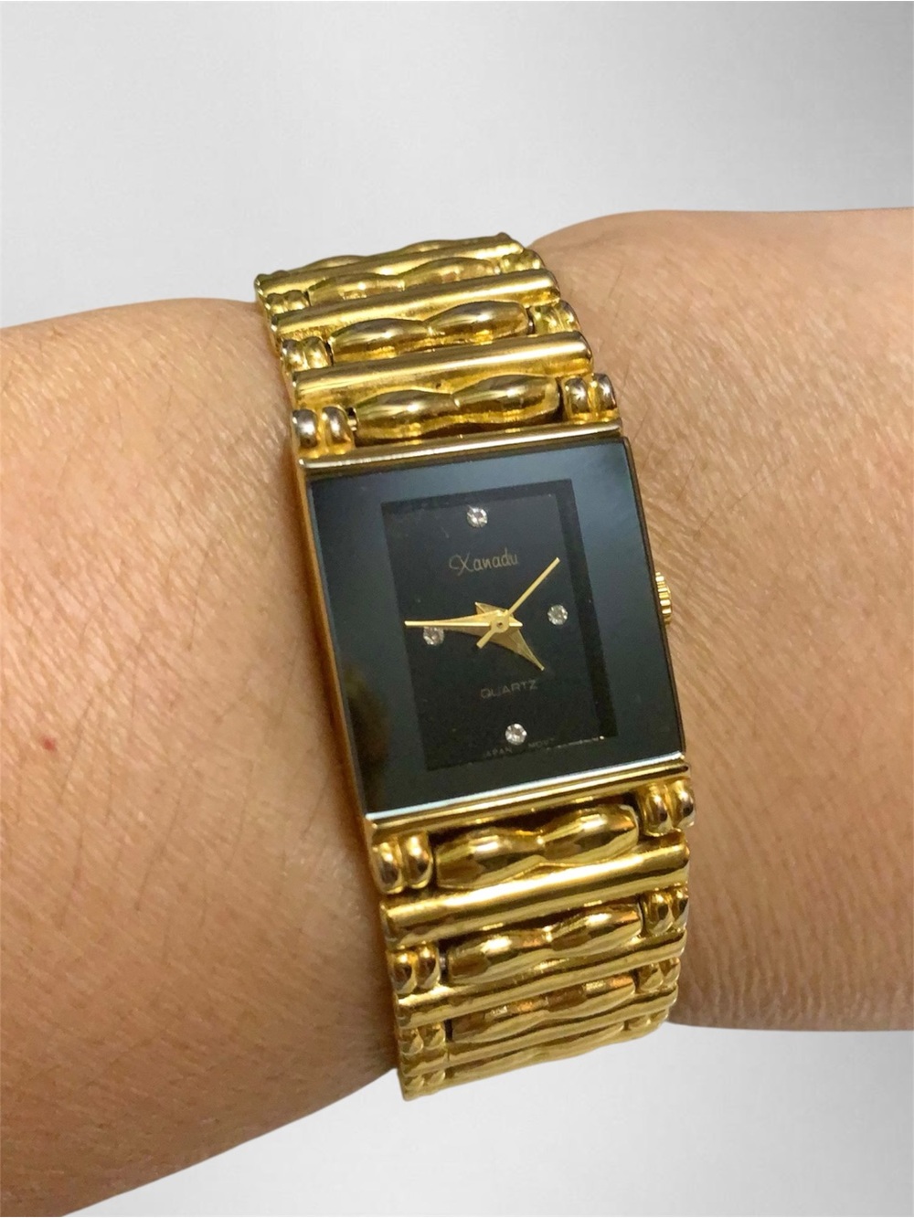 Xanadu Women's Gold-Tone Bracelet Watch with Black Dial